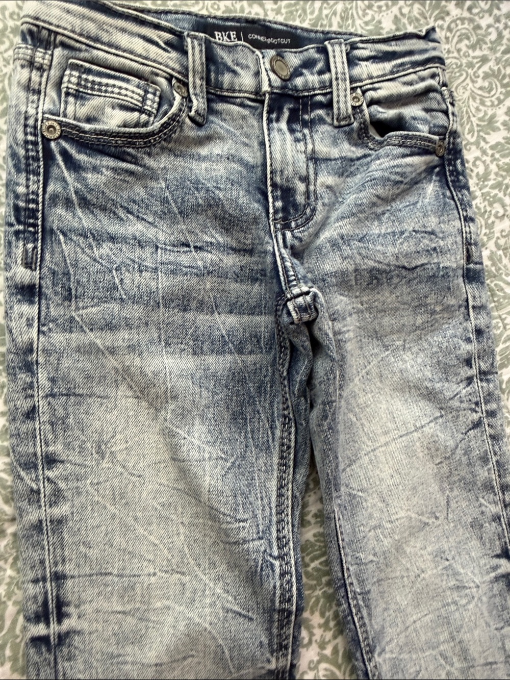 Buckle Light Blue Denim Jeans with Embroidered Back Pockets